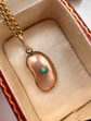 VICTORIAN 9CT GOLD & TURQUOISE LUCKY BEAN PENDANT