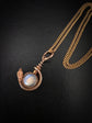 VICTORIAN COILED SNAKE & MOONSTONE PENDANT