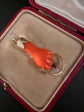 19TH CENTURY CORAL & 18CT GOLD HAND PENDANT