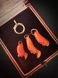 EARLY 19TH CENTURY PUNCHINELLO CORAL PENDANTS WITH LARGE BOLT RING BAIL