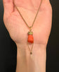 EARLY 19TH CENTURY CORAL HAND PENDANT