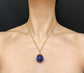 LAPIS LAZULI GLOBE PENDANT WITH 18CT TWISTED BAIL