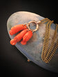 EARLY 19TH CENTURY PUNCHINELLO CORAL PENDANTS WITH LARGE BOLT RING BAIL