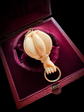 BALLOON CUFFED CELLULOID HAND PENDANT