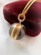 VICTORIAN ROCK CRYSTAL & 15CT GOLD SPHERE LOCKET PENDANT