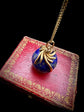 LAPIS LAZULI GLOBE PENDANT WITH 18CT TWISTED BAIL