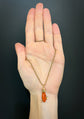 EARLY 19TH CENTURY CORAL HAND WITH GOLD KEY PENDANT