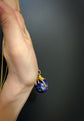 LAPIS LAZULI GLOBE PENDANT WITH 18CT TWISTED BAIL