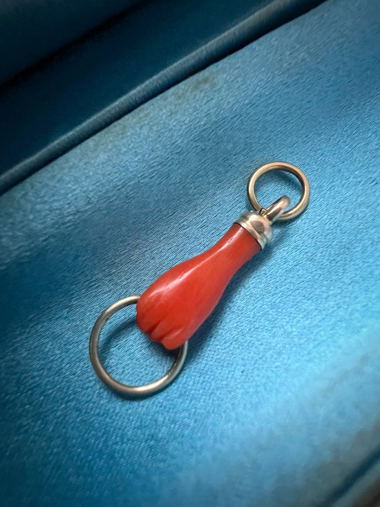 EARLY 19TH CENTURY CORAL HAND PENDANT