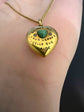 A VICTORIAN 15CT GOLD LOVE HEART PENDANT