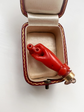 EARLY 19TH CENTURY CORAL HAND WITH BINOCULARS PENDANT