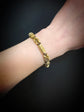 GEORGIAN 15CT GOLD BRACELET WITH A GEM SET HAND & SNAKE CLASP