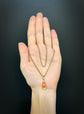 19TH CENTURY CORAL HAND PENDANT