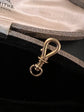 19TH CENTURY 9CT GOLD TWIST DOG CLIP