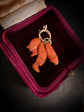 EARLY 19TH CENTURY PUNCHINELLO CORAL PENDANTS WITH LARGE BOLT RING BAIL