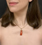 EARLY 19TH CENTURY CORAL HAND WITH BINOCULARS PENDANT