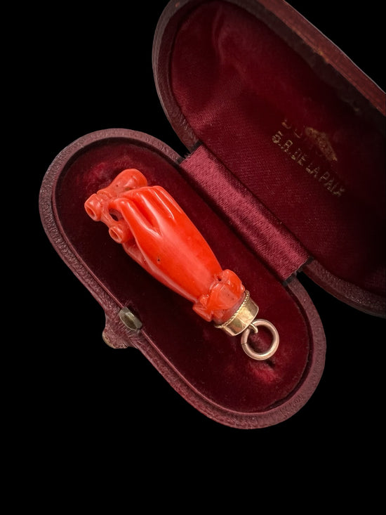 EARLY 19TH CENTURY CORAL HAND WITH BINOCULARS PENDANT