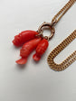 EARLY 19TH CENTURY PUNCHINELLO CORAL PENDANTS WITH LARGE BOLT RING BAIL