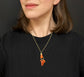 19TH CENTURY CORAL HAND PENDANT