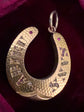 VICTORIAN DIAMOND & RUBY 15CT GOLD HORSESHOE PENDANT ‘SANS ADIEU’