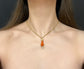 19TH CENTURY CORAL & 18CT GOLD HAND PENDANT