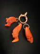 EARLY 19TH CENTURY PUNCHINELLO CORAL PENDANTS WITH LARGE BOLT RING BAIL