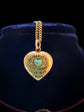 A VICTORIAN 15CT GOLD LOVE HEART PENDANT