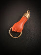 19TH CENTURY CORAL & 18CT GOLD HAND PENDANT