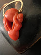 EARLY 19TH CENTURY CORAL CHERUB PADLOCK PENDANT