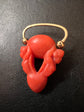 EARLY 19TH CENTURY CORAL CHERUB PADLOCK PENDANT