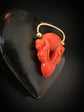 EARLY 19TH CENTURY CORAL CHERUB PADLOCK PENDANT