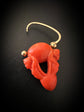 EARLY 19TH CENTURY CORAL CHERUB PADLOCK PENDANT