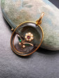 VICTORIAN ROCK CRYSTAL PENDANT WITH PEARL, EMERALD & RUBY DAISY FLOWER