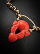 EARLY 19TH CENTURY CORAL CHERUB PADLOCK PENDANT