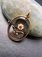 VICTORIAN ROCK CRYSTAL PENDANT WITH PEARL, EMERALD & RUBY DAISY FLOWER