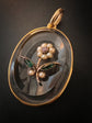 VICTORIAN ROCK CRYSTAL PENDANT WITH PEARL, EMERALD & RUBY DAISY FLOWER