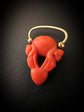 EARLY 19TH CENTURY CORAL CHERUB PADLOCK PENDANT