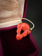 EARLY 19TH CENTURY CORAL CHERUB PADLOCK PENDANT