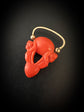 EARLY 19TH CENTURY CORAL CHERUB PADLOCK PENDANT