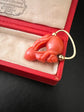 EARLY 19TH CENTURY CORAL CHERUB PADLOCK PENDANT