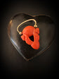 EARLY 19TH CENTURY CORAL CHERUB PADLOCK PENDANT