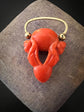 EARLY 19TH CENTURY CORAL CHERUB PADLOCK PENDANT