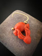 EARLY 19TH CENTURY CORAL CHERUB PADLOCK PENDANT