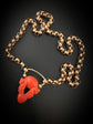 EARLY 19TH CENTURY CORAL CHERUB PADLOCK PENDANT