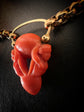 EARLY 19TH CENTURY CORAL CHERUB PADLOCK PENDANT